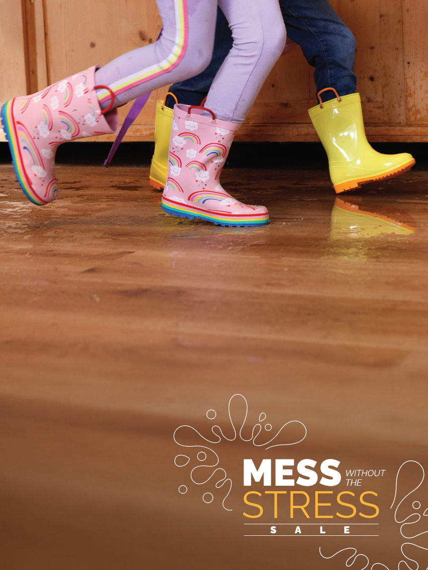 Mom and daughter playing with tablet on hard surface floors